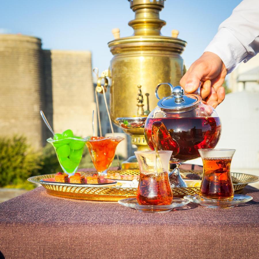 Promenade Hotel Баку Екстериор снимка Tea in traditional glasses